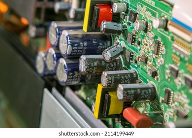 LED TV Motherboard With Chips, Transistors And Heat Sinks. Close-up, Selective Focus. Electronics Repair Shop