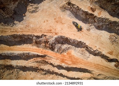 Ledges Of A Quarry After Blasting And Drilling Operations. Aerial View Of Open-pit Mine