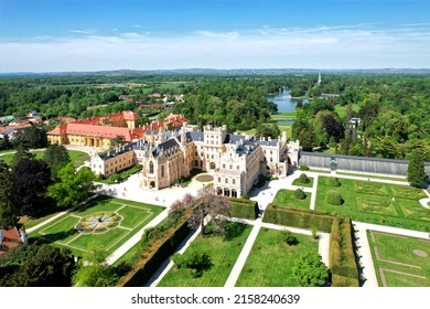 Lednice Chateau extra wide panorama aerial photography with garden and park on summer day. Lednice - Valtice landscape, Czech South Moravia region. World Heritage Site.