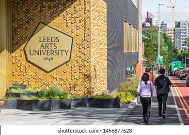 Leeds / England - July, 06,2019: Leeds Art University  Sign People Walking By 