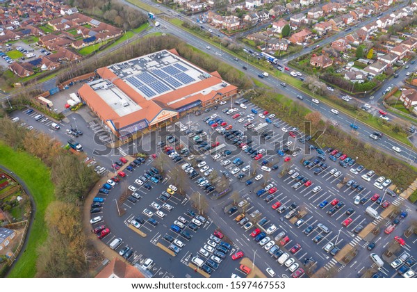 Leeds UK 24th Dec 2019: Aerial photos of a large\
shopping centre and carpark in the town of Colton in Leeds West\
Yorkshire UK