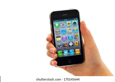 LEEDS, UK - FEBRUARY 26, 2012: Apple iPhone in a female hand, the iPhone is one of the most popular smart phones in the world.