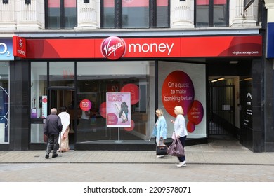 LEEDS, UK - JULY 12, 2016: People Visit Virgin Money Branch In Leeds, UK. The Banking And Mortgage Financial Specialist Virgin Money Is Part Of Virgin Group And Has 75 Offices.