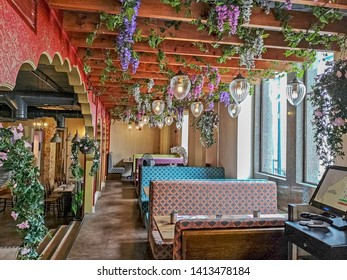 LEEDS, UK - MAY 26, 2019: View Of The Interior Of The Tiffin Inn Indian Restaurant At Lunch Time Just After Opening