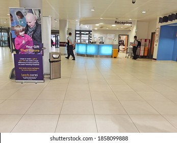 LEEDS, UK - NOVEMBER 19, 2020: An Interior Atrium Of St James's University Hospital Known As Jimmy's With Patients And Visitors Wandering Through.