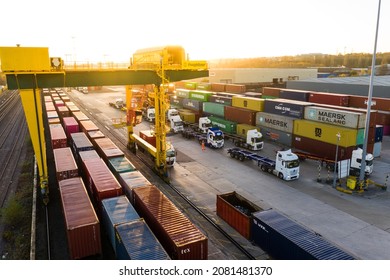 LEEDS, UK - NOVEMBER 22, 2021.  Aerial View Of A Busy Shipping Container Rail Terminal In Leeds With Shipping Boxes Waiting To Be Loaded Onto Road And Reail Transport