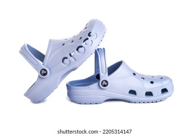 Leesburg. Virginia. USA. 21.09.2022.  Blue Crocs Footwear, Foam Clog Shoes On A White Background.