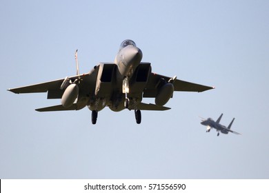 LEEUWARDEN, NETHERLANDS - APR 11, 2016: Two US Air Force F-15 Eagle Fighter Jets Landing.