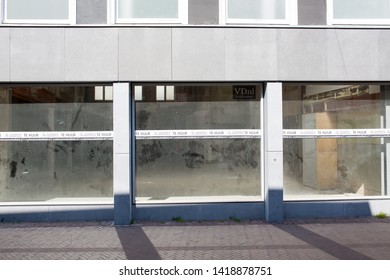 Leeuwarden, The Netherlands - April 2019. Empty For Rent Vacant Store Front / Facade.