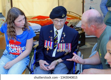 LEEUWARDEN, NETHERLANDS - May 5, 2018. Elderly Canadian War Veteran With Many Medals Is Talking To Dutch People. He Is Visiting Holland To Remember Liberation 1945 On Bevrijdingsdag (Liberation Day). 