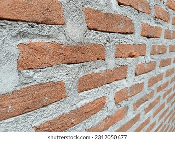 left angle red brick background - Shutterstock ID 2312050677