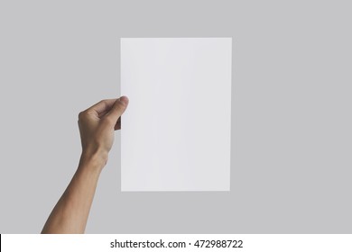 Left Hand Holding A4 Paper In The Left Hand. Leaflet Presentation. Pamphlet Hand Man. Man Show Offset Paper. Sheet Template. Book In Hands. Booklet Folding Design. Fold Paper Sheet Display Read.