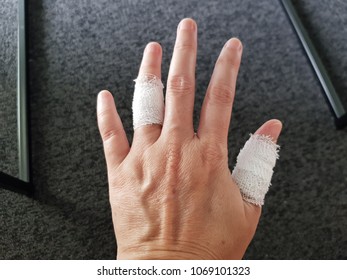 Left Hand, Thumb And Ring Finger As A Wounds, Wrap It With A Bandage.