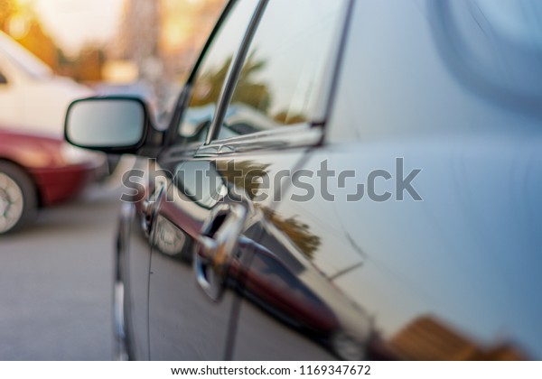 the left side of\
the car side view mirror