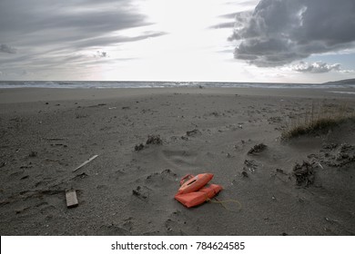 Lefted Life Vest On The Coastline In Gokceada Canakkale Turkey 29.12.2017