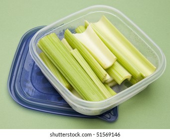 Leftover Celery In A Plastic Container With Condensation.