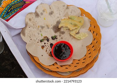 Leftover Food And Soy Sauce Residue On The Plate