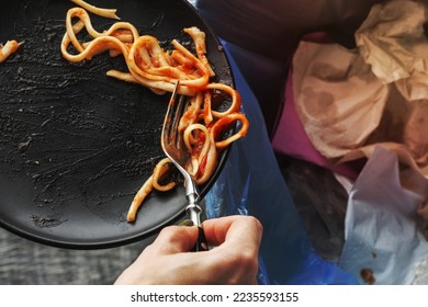 leftover wasted spaghetti pasta thrown bin. Resolution and high quality beautiful photo