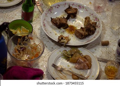 Leftovers And Leftovers On The Holiday Table At The End Of The Party