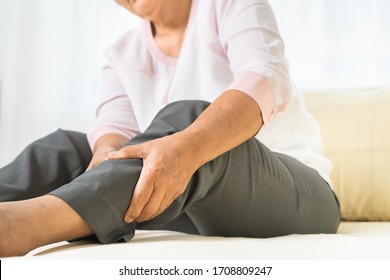 leg pain of senior woman at home, healthcare problem of senior concept