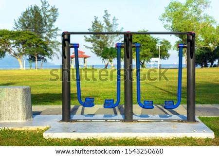 Leg swing exercise equipment in the playground near the beach