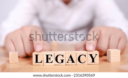 Legacy, text words typography written with wooden letter, life and business motivational inspirational concept