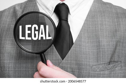 Legal Acronym Of Master Of Business Administration Degree. Education Concept. Businessman Hands With Magnifier.