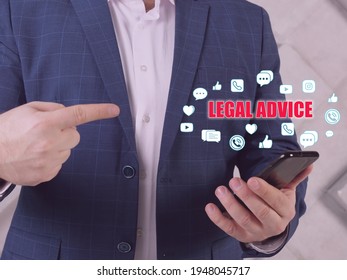  LEGAL ADVICE text in search bar. Businessman looking at cellphone. The giving of a professional regarding the substance or procedure of theÂ lawÂ in relation to a particular factual situation - Shutterstock ID 1948045717