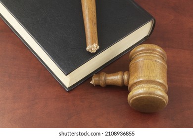 Legal book and broken wooden judge gavel on table close up. Concept of iniquity, injustice and no laws. - Shutterstock ID 2108936855