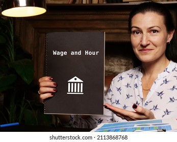 Legal Concept About Wage And Hour With Phrase On The Piece Of Paper.
