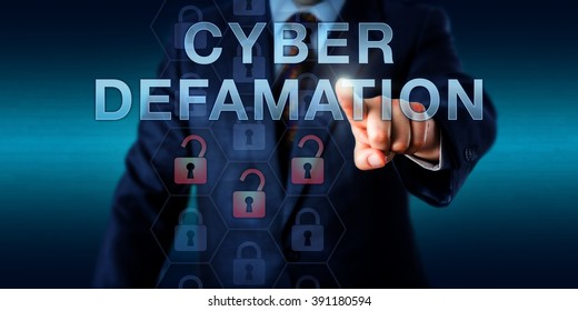 Legal Consultant Is Touching CYBER DEFAMATION On A Virtual Interface. Information Technology Concept For Defamation Via Malicious Online Commentary In Forums, Websites And Internet Portals.