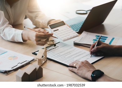 Legal Consultants, Notary Or Justice Lawyer Discussing Contract Document On Desk With Client Customer In Courtroom Office, Business, Justice Law, Insurance, Legal Service, Buy And Sell House Concept.