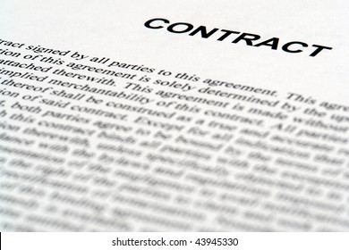 Legal contract in English on sheet of paper (fictitious document with authentic common law language)