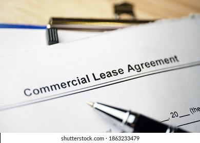 Legal document Commercial Lease Agreement on paper.