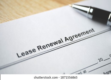 Legal Document Lease Renewal Agreement On Paper Close Up.