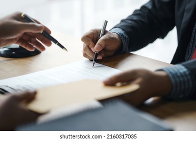 The Legal Execution Department makes an appointment with the customer to sign a mediation agreement to pay the debt. - Shutterstock ID 2160317035