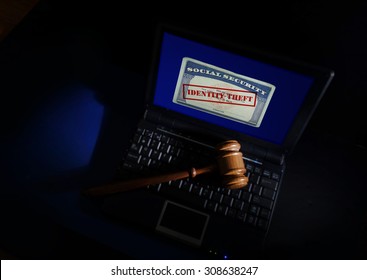 Legal Gavel On A Laptop  With Identity Theft Social Security Card  