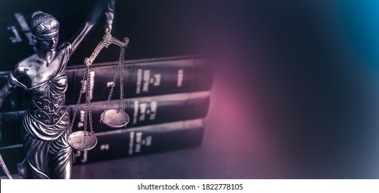 Legal law concept image Scales of Justice and case books on desk. - Shutterstock ID 1822778105