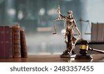 Legal and law concept. Statue of Lady Justice with scales of justice and wooden judge gavel on wooden table. Panoramic image statue of lady justice.