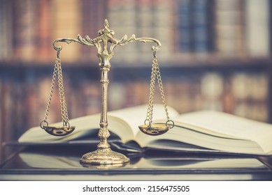 Legal office of lawyers, justice and law concept : Retro balance scale of justice on a desk in a courtroom, depicting giving fair and objective consideration to all evidence, without showing bias. - Shutterstock ID 2156475505