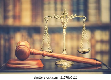 Legal office of lawyers, justice and law concept : Retro balance scale of justice on a desk in a courtroom, depicting giving fair and objective consideration to all evidence, without showing bias. - Shutterstock ID 2157860121
