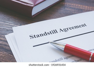 Legal term Standstill Agreement information and red pen.
