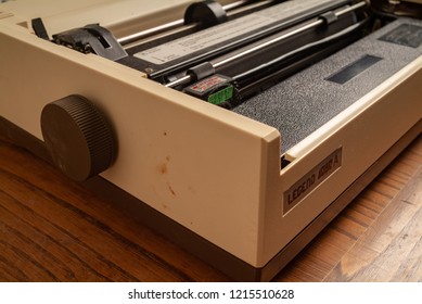 Legend 1980s Dot Matrix Printer. Kitchen Wood Table Inside A Private Apartment. Italy Europe