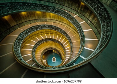 Legendary design spiral staircase interior of Bramante Staircase in Vatican Museums in the Vatican City , Rome , Italy taken on Oct 5, 2018 in Vatican.