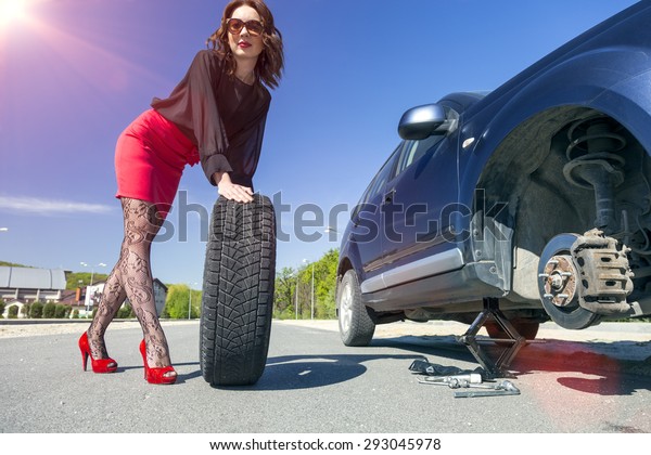 Leggy Female Changing Wheel Car Lady Stock Photo (Edit Now) 293045978