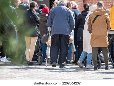 Legionowo, Poland - April 16, 2022: Blessing Food In Front Of The Church. Christian Tradition For Easter. People With Baskets In Front Of The Church.