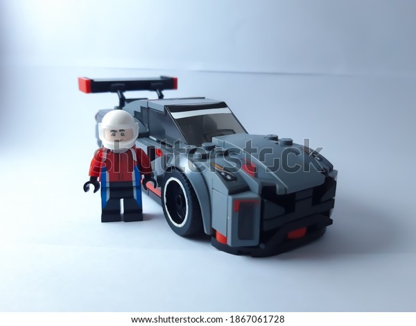 Lego racers out of the car to pose in a\
mini studio. Jambi, Indonesia - November\
2020