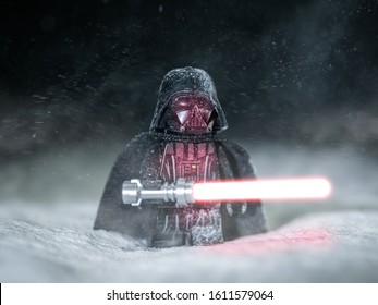 Lego Star Wars. Darth Wader With His Light Saber In A Snow Storm. 