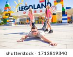 LEGOLAND DUBAI, 19 FEBRUARY 2020 - Dad is fooling around with children before going to Legoland at Dubai parks and resorts, Dubai, United Arab Emirates