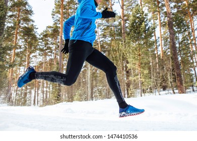 Legs Athlete Runner Run Through The Winter Forest Training
